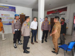 Polsek Tanah Putih Kawal Rapat Pleno Perhitungan Suara Pemilu di PPK Tanah Putih